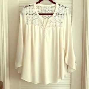 Cream crochet detailed top.